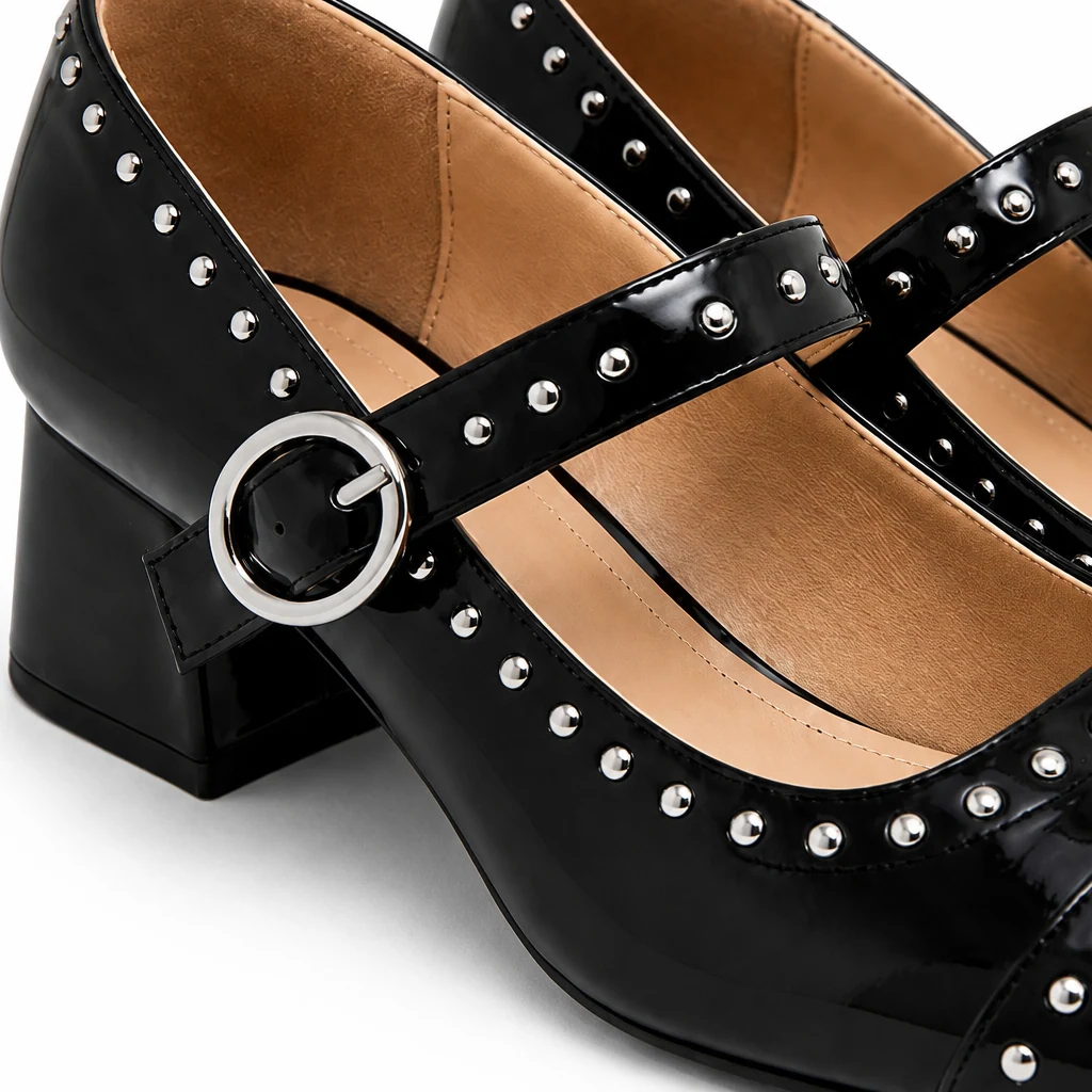 Close-up detail of Mary Jane shoe strap, rivets, upper finish, and heel construction